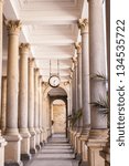 Corridor of columns and clocks