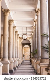 Corridor of columns and clocks