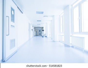 Corridor in hospital with carts illuminated by sunlight