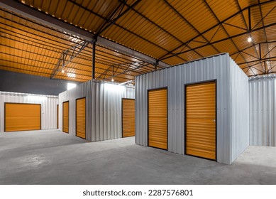 Corridor of self storage unit with red doors. Rental Storage Units