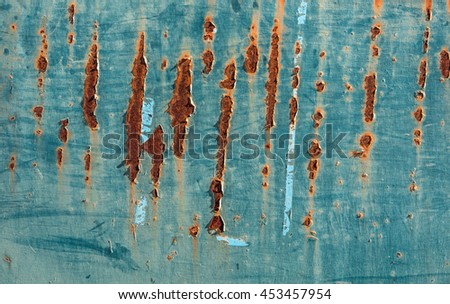 Corroded blue metal background with rusty scratches. Industrial, urban deteriorated texture.