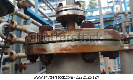 A Corroded Flange, Bolts and Nuts Photo That is Perfect for Equipment Maintenance Company, Corrosion Control Product, Chemical Cleaning Company, Corrosion Prevention Products