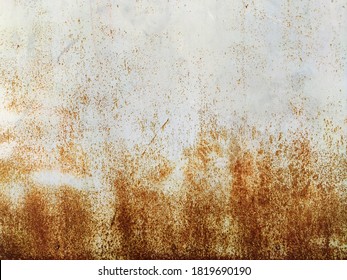 Corroded metal background. Rusted grey painted metal wall. Rusty metal background with streaks of rust. Rust stains. The metal surface rusted spots. Rystycorrosion. - Shutterstock ID 1819690190