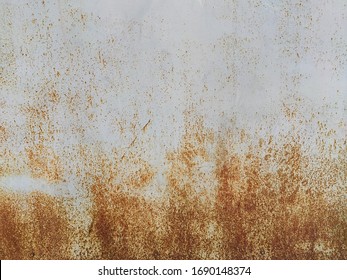 Corroded metal background. Rusty metal background with streaks of rust. Rust stains. Rystycorrosion. - Shutterstock ID 1690148374