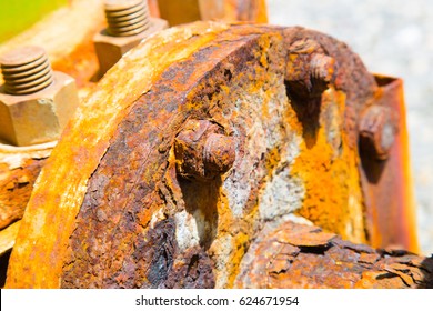 Corrosive rusted bolt with nut at font