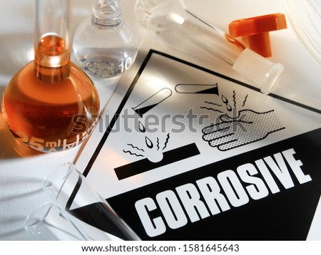 Corrosive Warning Sign - A corrosive substance is one that will damage or destroy other substances with which it comes into contact by means of a chemical reaction. ストックフォト © 