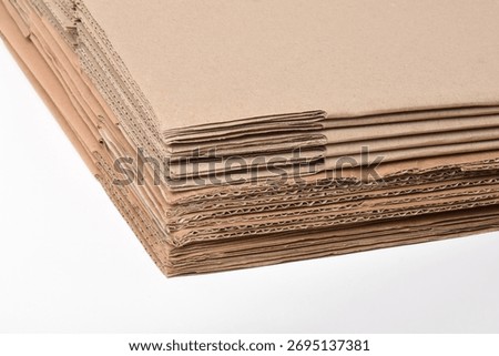 Corrugated cardboard box stack isolated white background