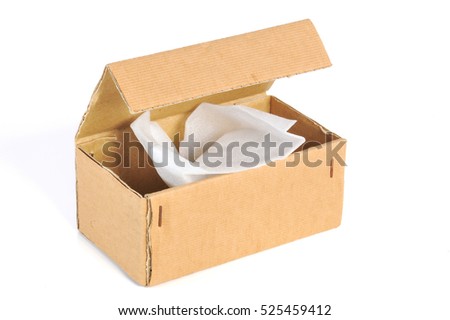 corrugated cardboard or brown paper package box open with foam shockproof isolated on white background
