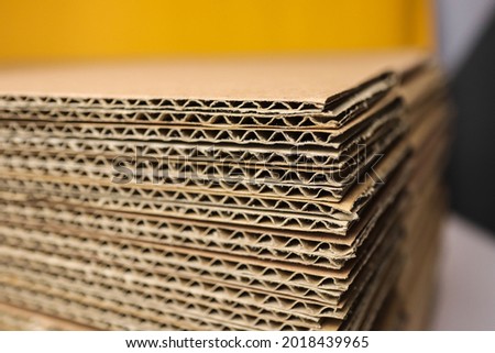 corrugated cardboard for packing, Pile of corrugated cardboard sheets and ready to use