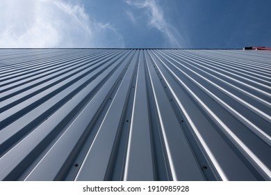 Corrugated Iron Sheet, Aluminum Facade Of A Warehouse As Background Texture