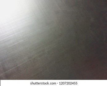corrugated metal alloy as a background, metal surface, aluminum alloy, magnesium alloy, sun flare, grainy texture
