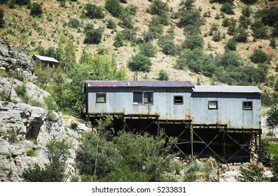 Corrugated Metal Miner's Shack Perched On An Arizona Hillside.