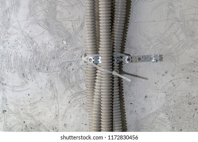 clamp pipe corrugated bunch pipes concrete shutterstock ceiling