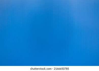 Corrugated Plastic Sheet Or PP Flute Board (polypropylene Board). Blue Background With Stripe Effect.