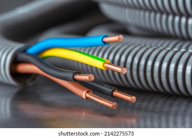 Corrugated Tube Electric Conduit Pipe with Copper Power Supply Installation Cable - Shutterstock ID 2142275573