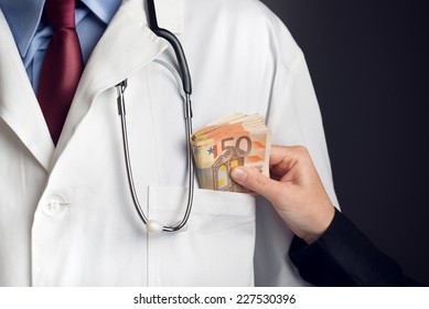 Corruption In Health Care Industry, Doctor Receiving Large Amount Of Euro Banknotes As A Bribe.