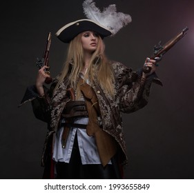 Corsair blond with guns against dark background