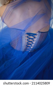 Corset Lacing On A Blue Ball Gown