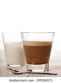 Cortado coffee drink in glass