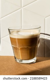 Cortado Coffee In A Glass Glass On A Beige Background. Spanish Coffee