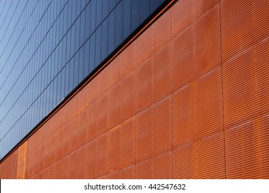 Corten steel and blue glass facade 