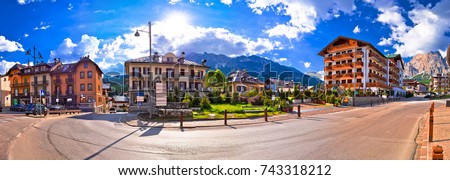 Cortina D' Ampezzo street and Alps peaks panoramic view, Veneto region of Italy