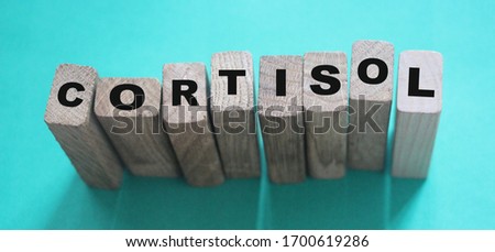 Cortisol word from wooden blocks. Medical concept.