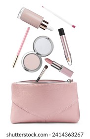 Cosmetic bag and falling makeup products into it on white background