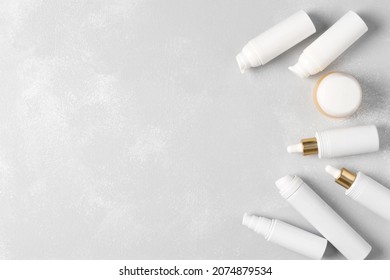 Cosmetic Beauty Products On Shabby Background. Top View, Flat Lay. Skin Care Cosmetics Frame. Copy Space