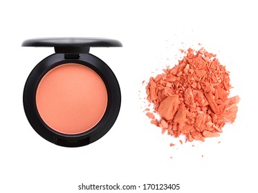 Cosmetic blush, container and crushed isolated on white background.
