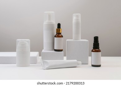 Cosmetic Bottle Containers With Blank Label For Branding Mock-up. Natural Cosmetics With Herbal Ingredients. Concept Of Organic Skincare