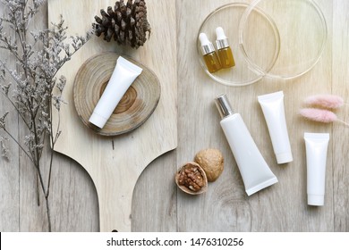 Cosmetic Bottle Containers Packaging With Winter Seasonal Theme, Blank Label For Organic Branding Mock-up, Natural Skincare Beauty Product Concept.