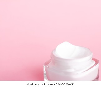 Cosmetic branding, toiletries and spf concept - Face cream moisturizer jar on pink background, moisturizing skin care lotion and lifting emulsion, anti-age cosmetics for luxury beauty skincare brand - Shutterstock ID 1634475604