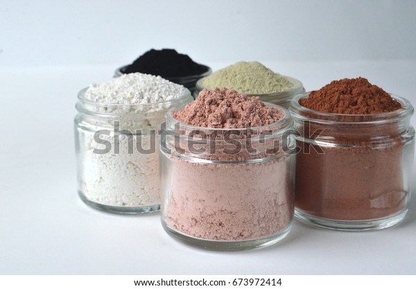 Cosmetic\
clays for facial beauty face masks - French green clay, pink, red\
clay, kaolin and powdered activated\
charcoal\
