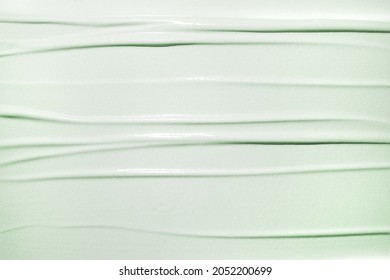 Cosmetic cream mask or balm mint green background