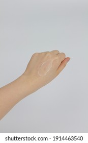 Cosmetic Cream Was Rubbed On The Back Of Woman's Clenched Left Hand.