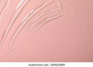 Cosmetic Gel On Pink Background, Top View. Space For Text