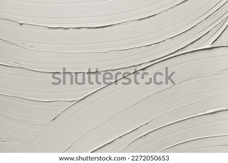 Cosmetic gray texture caolin clay mask background