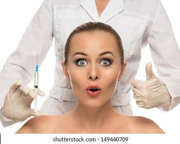 Cosmetic injection to the pretty Beautiful woman face and beautician hands with syringe. Doctor woman giving botox injections. Isolated on the white background.