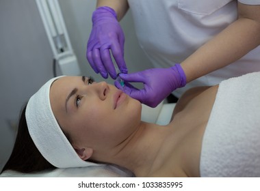 Cosmetic injection to the pretty woman face.