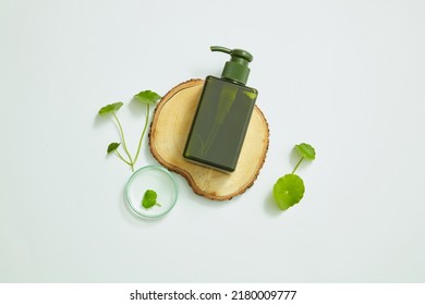 Cosmetic jar from mugwort extract ingredient , nature ingredient for skin care white background , cosmetic content - Shutterstock ID 2180009777
