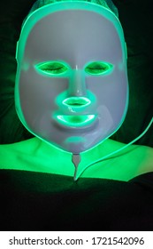 Cosmetic Mask Of Light Therapy On The Patient Face, Burning Green