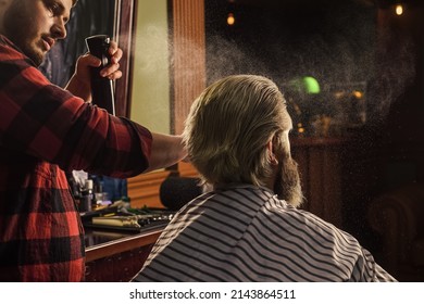 Cosmetic For Men. Hairstylist Serving Client At Barber Shop. Personal Stylist Barber. Retro And Vintage. Designing Haircut. Barber Tools In Barbershop. Handsome Hairdresser Cutting Hair Of Client