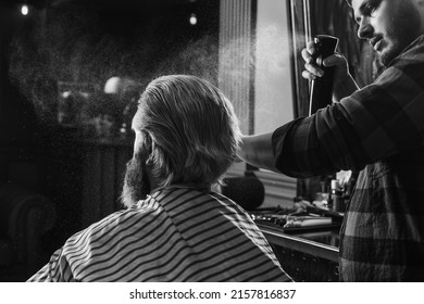 Cosmetic For Men. Hairstylist Serving Client At Barber Shop. Personal Stylist Barber. Retro And Vintage. Designing Haircut. Barber Tools In Barbershop. Handsome Hairdresser Cutting Hair Of Client