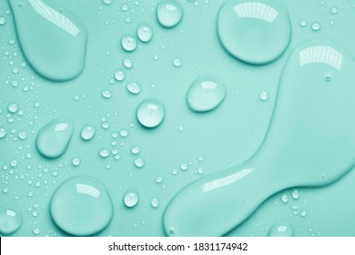 Cosmetic moisturizing liquid drops on green blue pastel background. Toner or lotion. Hyaluronic serum - Shutterstock ID 1831174942