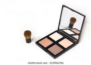 Cosmetic Palette On White Background Contour And Highlighter