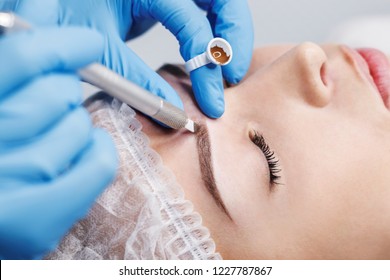 Cosmetic procedures for the treatment of eyebrows. Microblading in the beauty salon. Professional cosmetology.