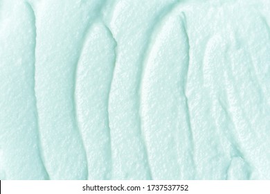 Cosmetic Product For The Face Cream Texture Of Blue Color. Body Scrub. Beauty Cosmetology Macro Background.