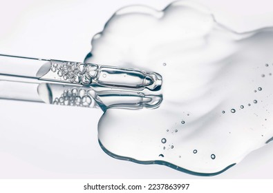Cosmetic serum texture with dropper transparent liquid background