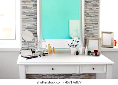 Cosmetic Set On Light Dressing Table